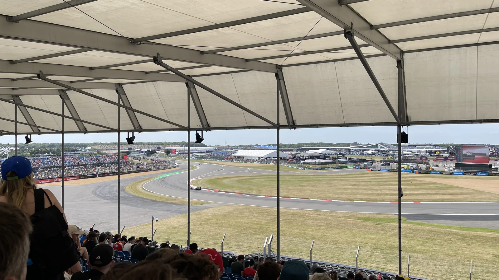 Formula 1 cars viewed from Becketts grandstand at Silverstone